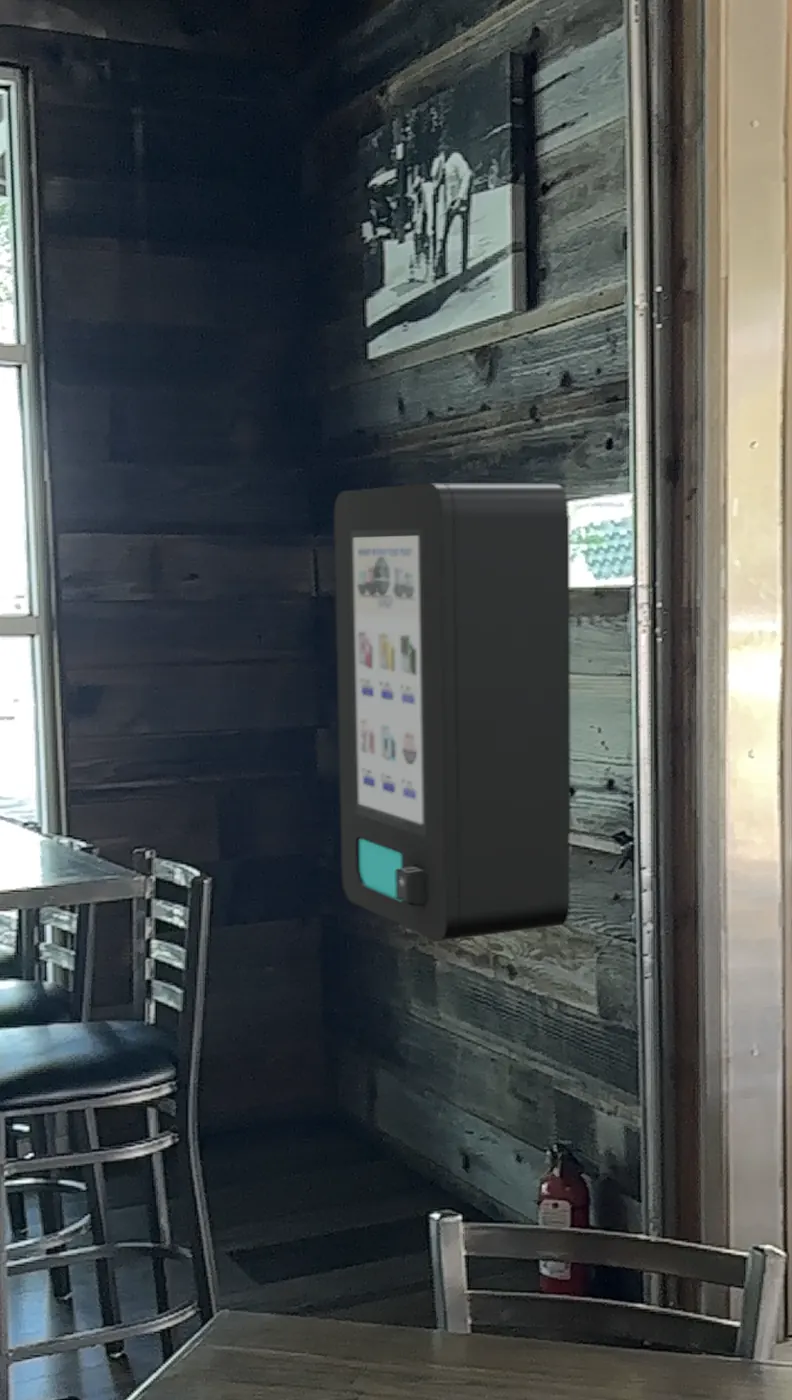 The Plug machine wall-mounted in a partner bar